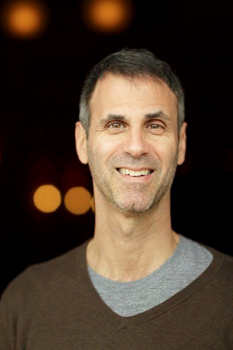 A headshot of Steve Almond, a bestselling author and co-host of the New York Times podcast "Dear Sugars"